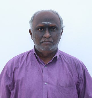 R. Anandaraman., M.Phil.,